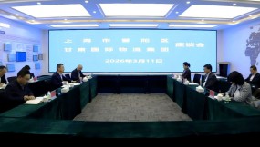  张铁强与上海市普陀区副区长周如意会谈